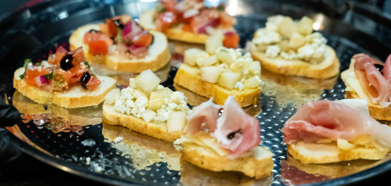 Holiday crostini with whipped goat cheese, bruschetta and prosciutto